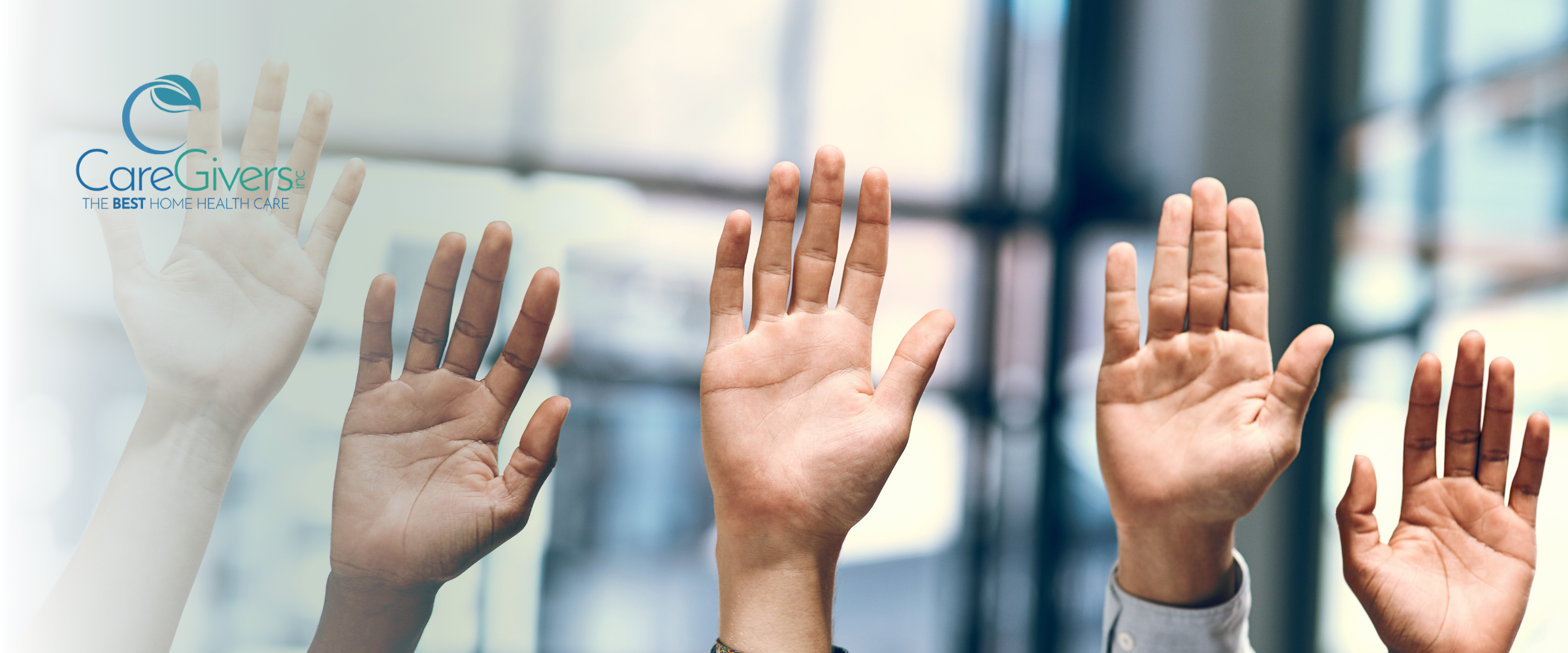 Diverse hands raised representing questions to ask before hiring a home care agency in Indianapolis.
